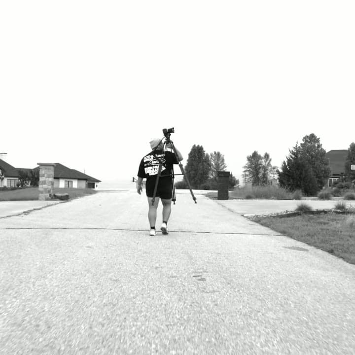Walking a tripod out to set up a shot